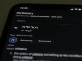 inflation word on smartphone touchscreen