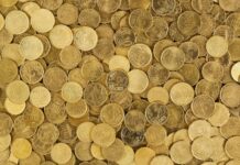 pile of gold round coins