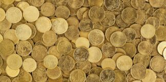 pile of gold round coins