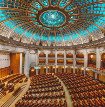 the interior of a large building with a dome