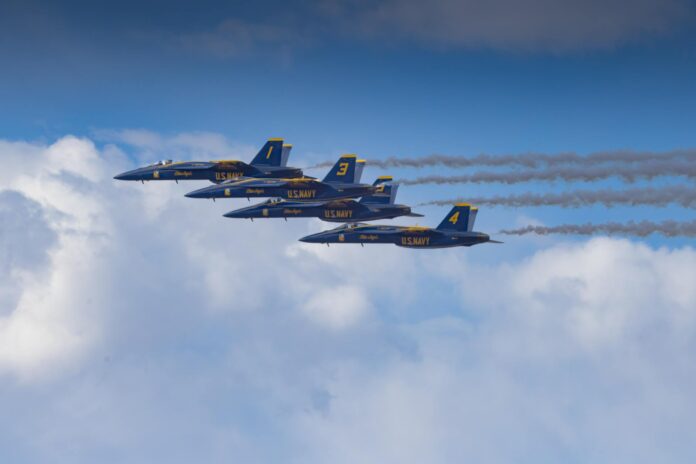 us navy blue angels jet formation in flight