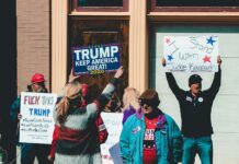 people protesting outside building